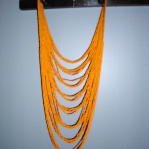 SOLD........Orange multi-strand seed bead necklace
